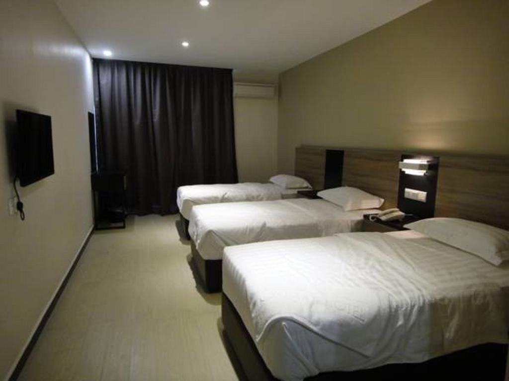Galaxy Hotel Simpang Ampat  Zimmer foto