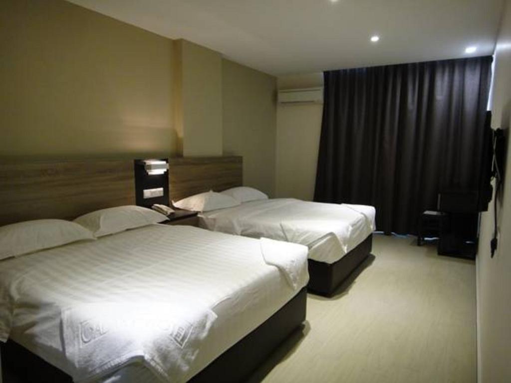 Galaxy Hotel Simpang Ampat  Zimmer foto